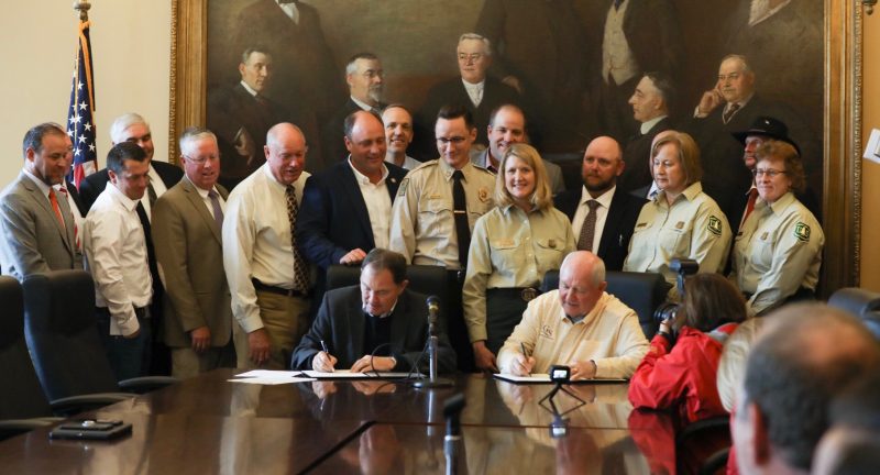 state and USDA forest services signing a stewardship agreement
